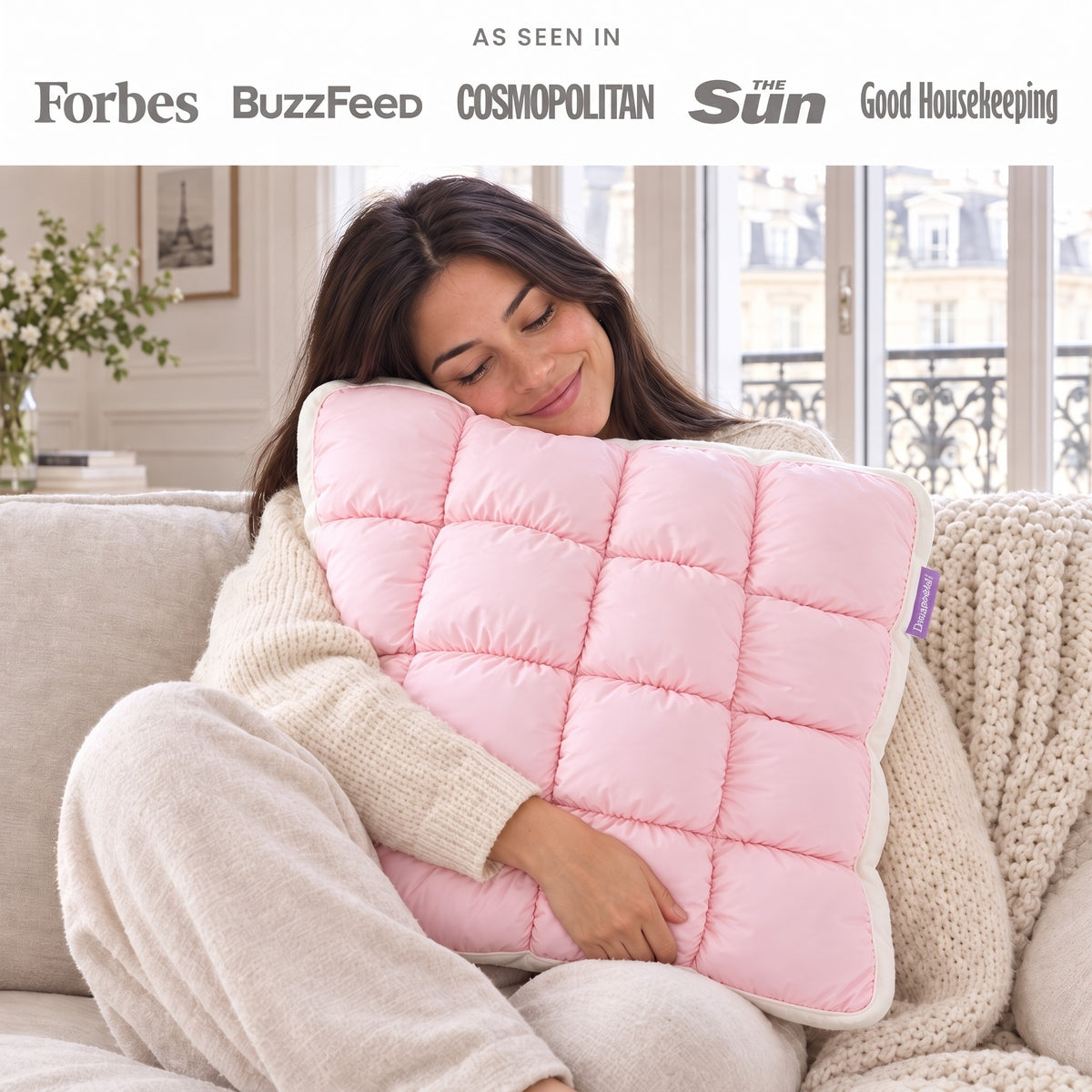 Baby pink DreamPuff on the couch, as seen in Forbes, BuzzFeed, Cosmopolitan, The Sun and Good Housekeeping