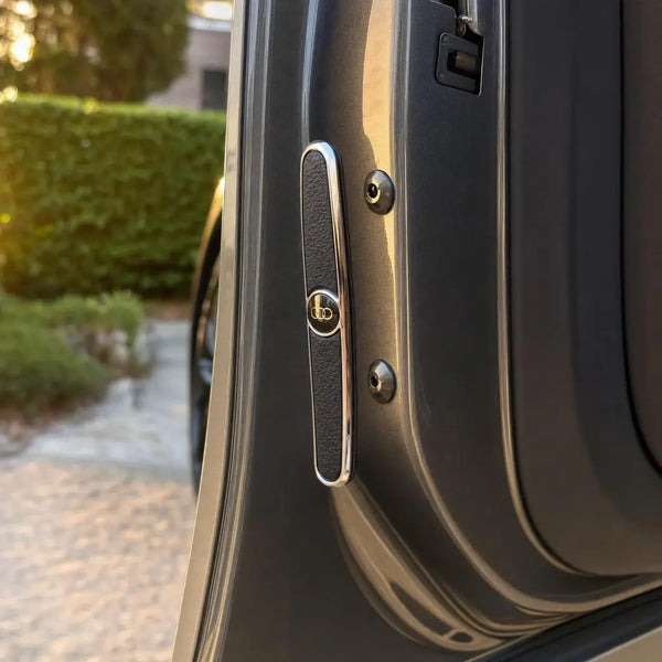 DentDefender door edge guard fitted on a car door at golden hour