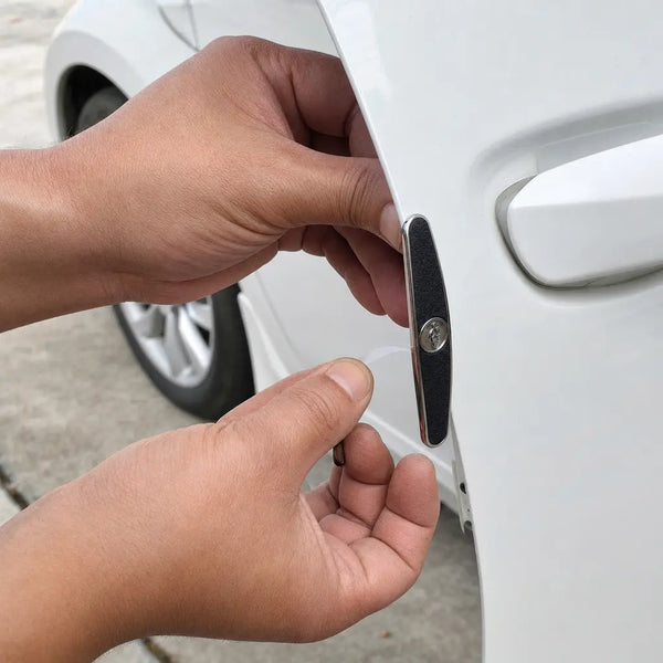 Pressing a DentDefender guard onto a car door edge