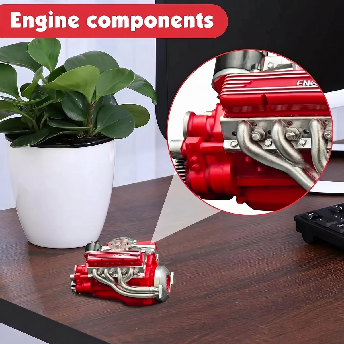 PistonPlay engine components: zoomed detail of the red V8 on a desk